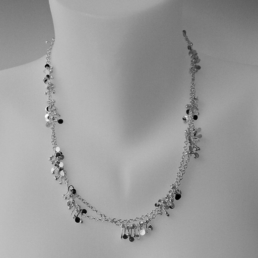 Blossom extra long daisy chain necklace, polished by Fiona DeMarco