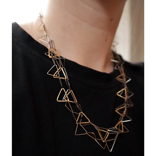 Fankle with gold plated triangles worn