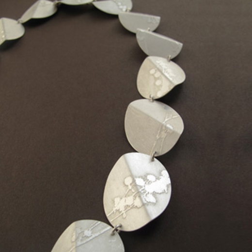 Multi folded oval necklace design detail