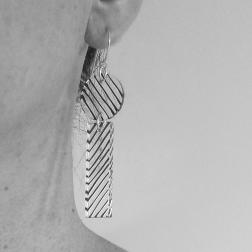 Studio earrings worn