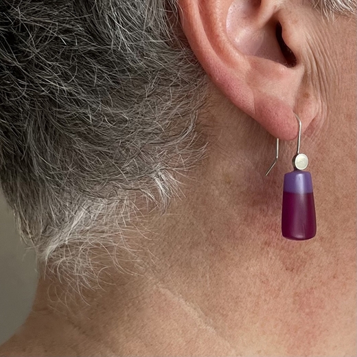 Purple resin earrings - worn