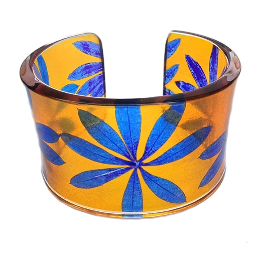 Tuemeric and yellow star leaf cuff on arm recycled plastic Sue Gregor
