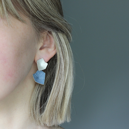 Lines in Motion earrings worn