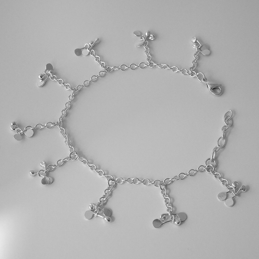 Blossom daisy chain dangling charm bracelet by Fiona DeMarco