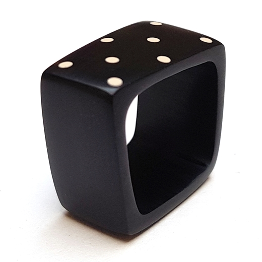Black square ring with nude spotty design