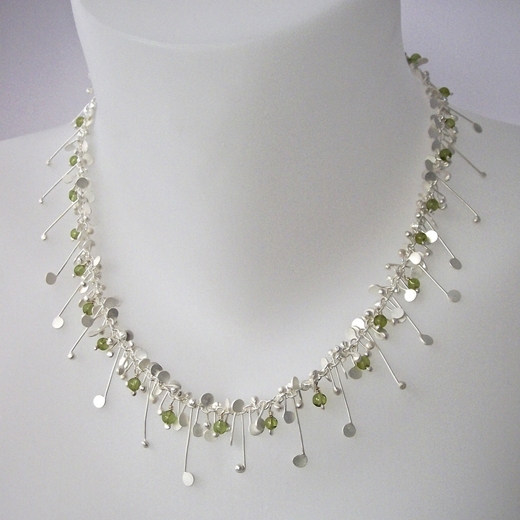 Blossom wire necklace with peridot, satin by Fiona DeMarco