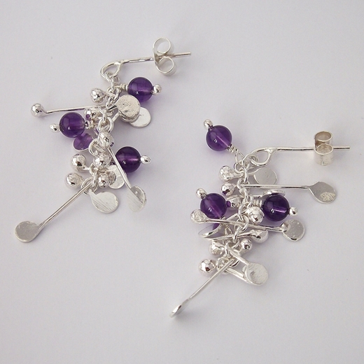 Blossom wire stud earrings with amethyst, polished by Fiona DeMarco