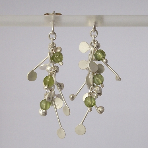 Blossom wire stud earrings with peridot, satin by Fiona DeMarco