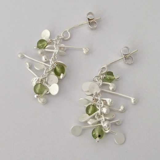 Blossom wire stud earrings with peridot, satin by Fiona DeMarco
