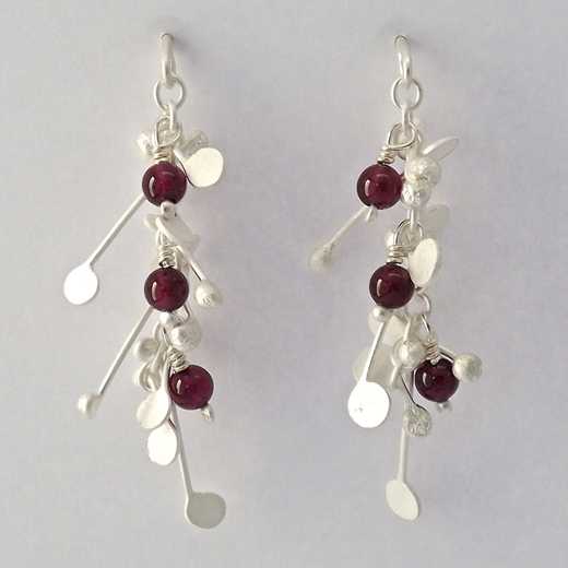 Blossom wire stud earrings with garnet, satin by Fiona DeMarco