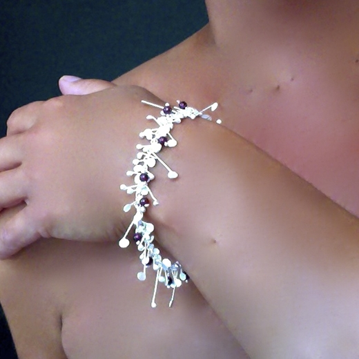Blossom wire bracelet with Garnet, satin by Fiona DeMarco