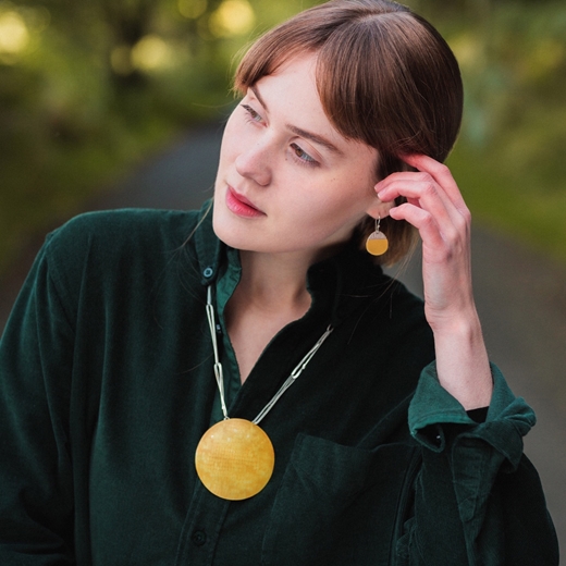 Large pendant in yellow on model