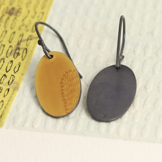 oval earrings, yellow, back view