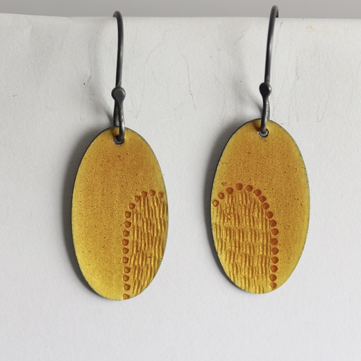 oval earrings, dark yellow