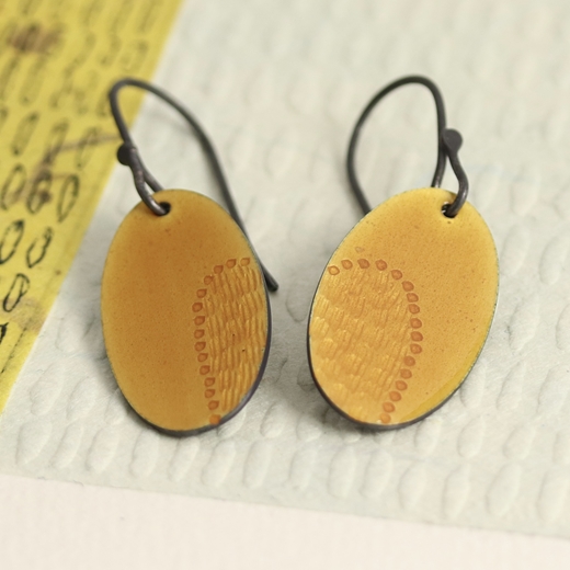 oval earrings, dark yellow