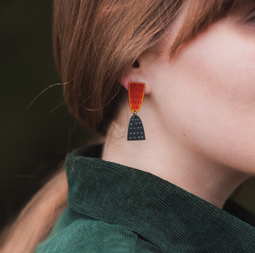 Leonora 1 earring, burnt orange on model