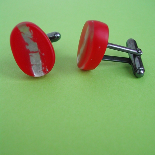 red oval cufflinks side view