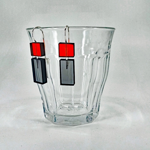 construction 1 earrings orange and grey short on glass