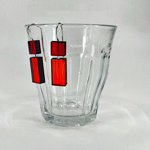 construction 1 earrings red and orange short on glass