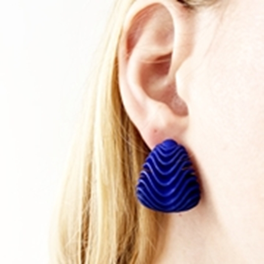 curved wave earring worn