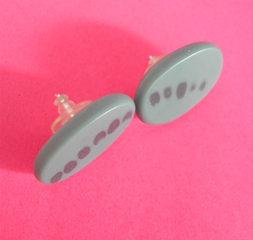 grey oval seeds detail earrings side view