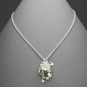 Blossom wire cluster pendant with peridot, satin