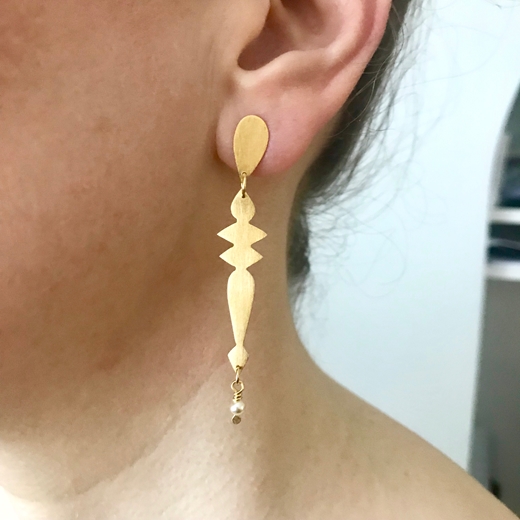 Finial Slender Earrings being worn