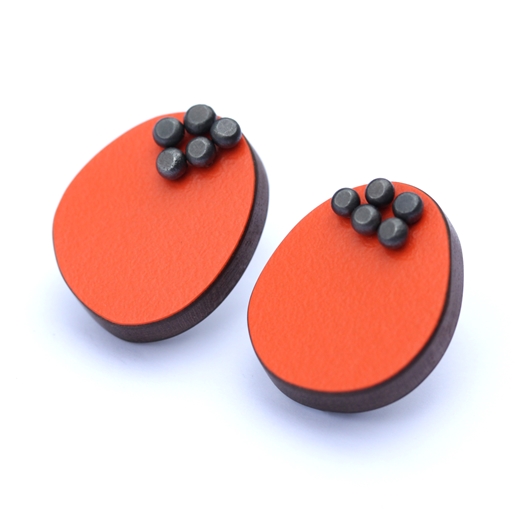 Orange dot pin studs side