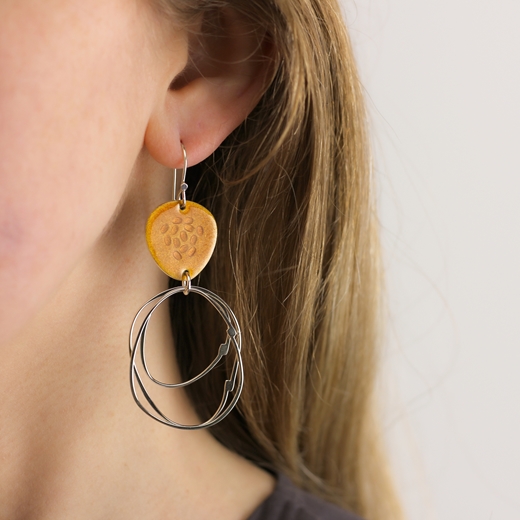 Flotsam earrings in Periwinkle Orange worn