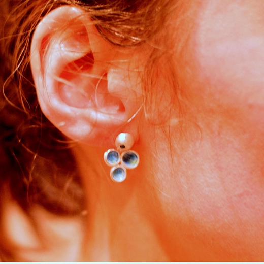 Flourish cluster earring worn