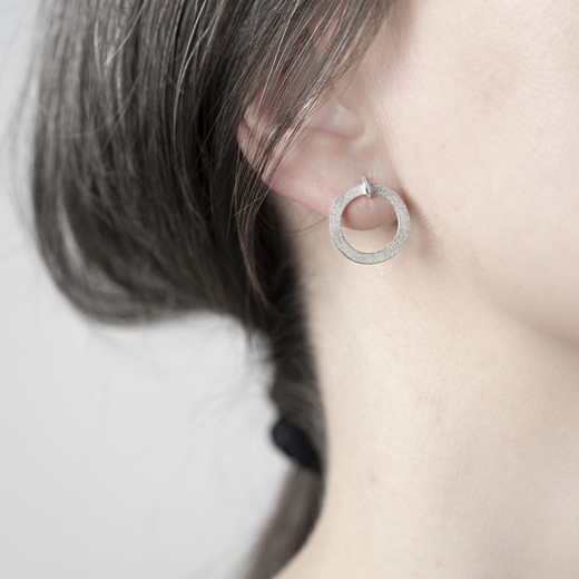 Forbes earrings on ear