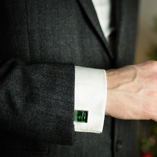 Green square cufflinks worn