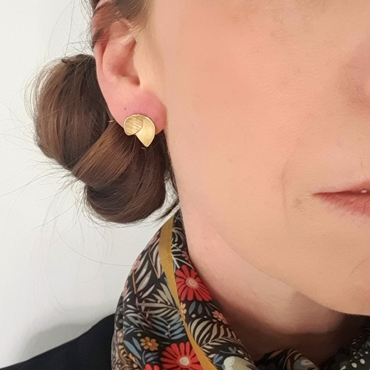 gold orchid leaf earring on