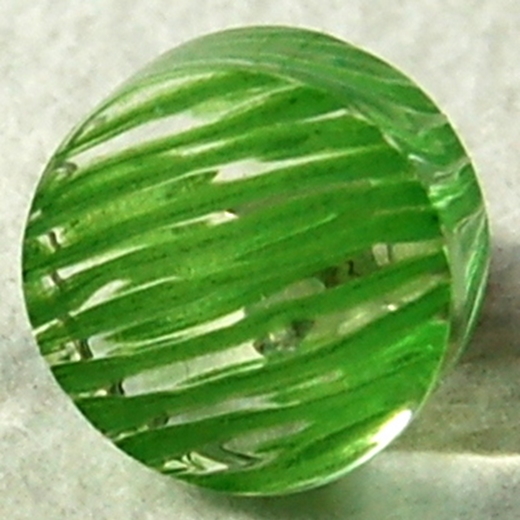 green disc stud earrings detail