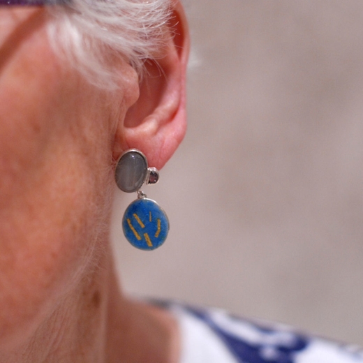 grey moonstone & spinel earring worn