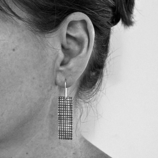 grid earrings worn