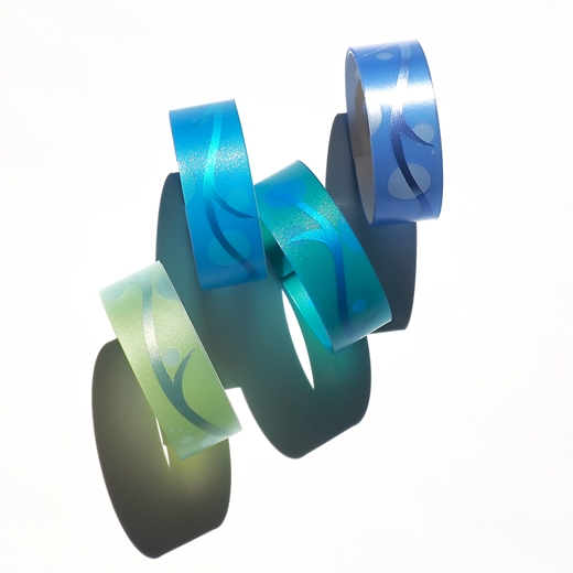 Group view featuring green and turquoise bangle