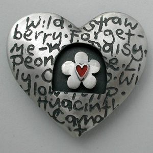 Heart brooch with spinning daisy