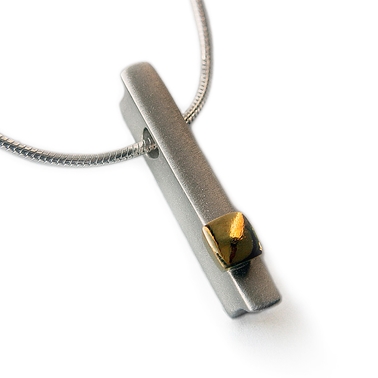 Silver ingot with chunky 18ct gold detail