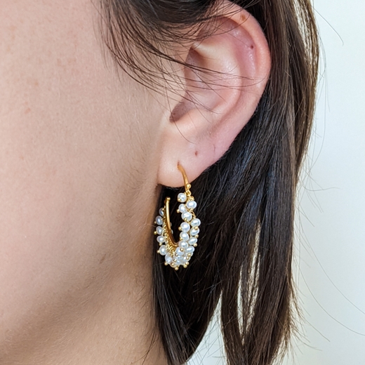 Pearl and gold vermeil hoop earrings - modelled front