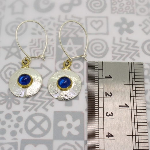 Round small earrings, blue spinel, ruler