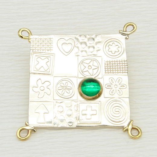 Asymmetrical square brooch, green spinel, 9