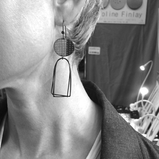 Islands earrings on model