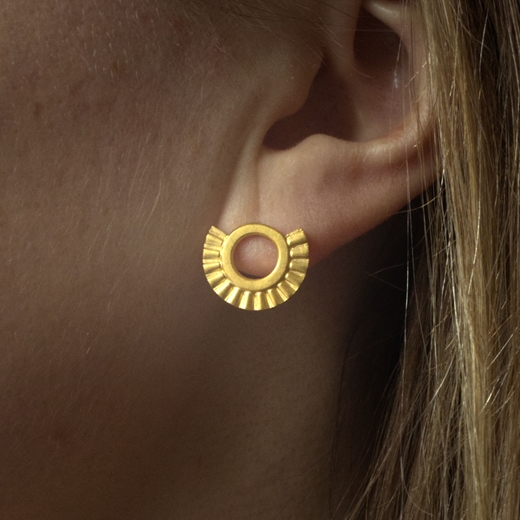 Small Sunray earrings on model