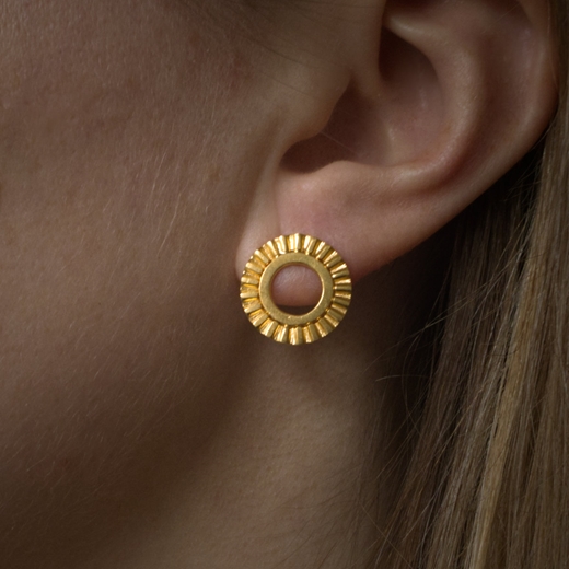 Sunray earrings on model