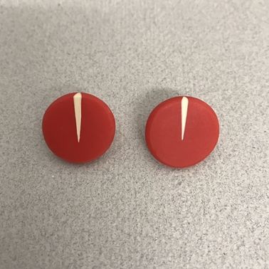 Red circle studs