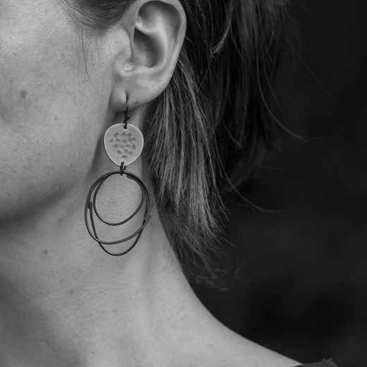 Flotsam earrings on model