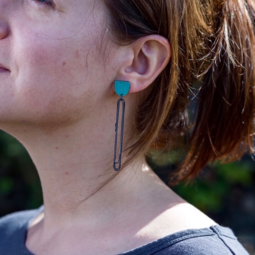 Flotsam earrings on model