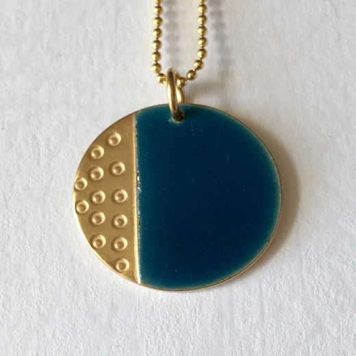 gold and blue pendant