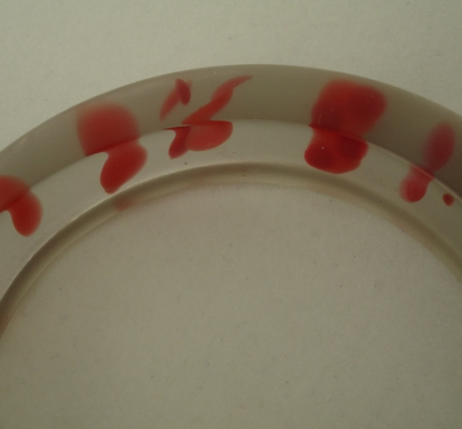 bangle trans grey and red blobs detail